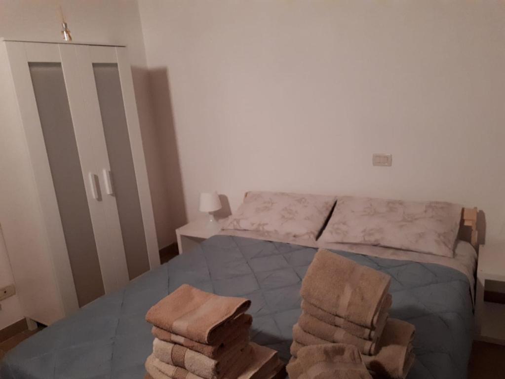 A bed or beds in a room at Agriturismo iL CASONE