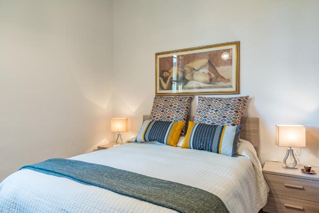 En eller flere senge i et værelse på Villa Agriturismo Tenuta la Campana