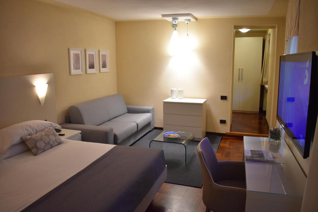 TV a/nebo společenská místnost v ubytování Hotel Boutique Antiche Mura