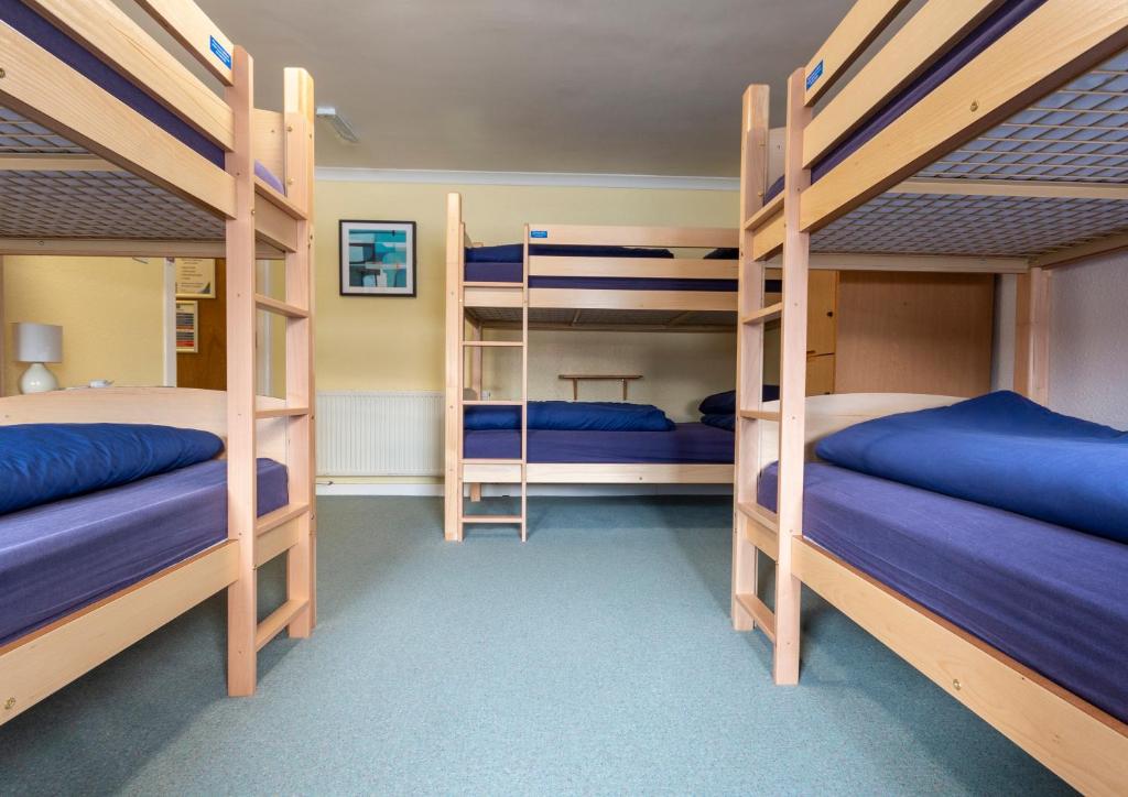 Voodi või voodid majutusasutuse Ullapool Youth Hostel toas