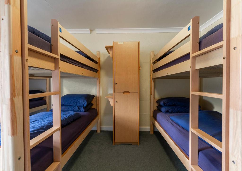 Voodi või voodid majutusasutuse Ullapool Youth Hostel toas