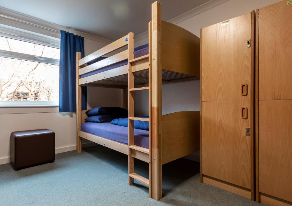 Voodi või voodid majutusasutuse Ullapool Youth Hostel toas