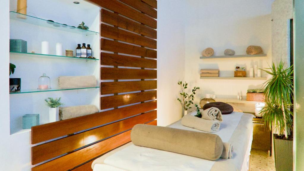 Postel nebo postele na pokoji v ubytování Hotel Uvala
