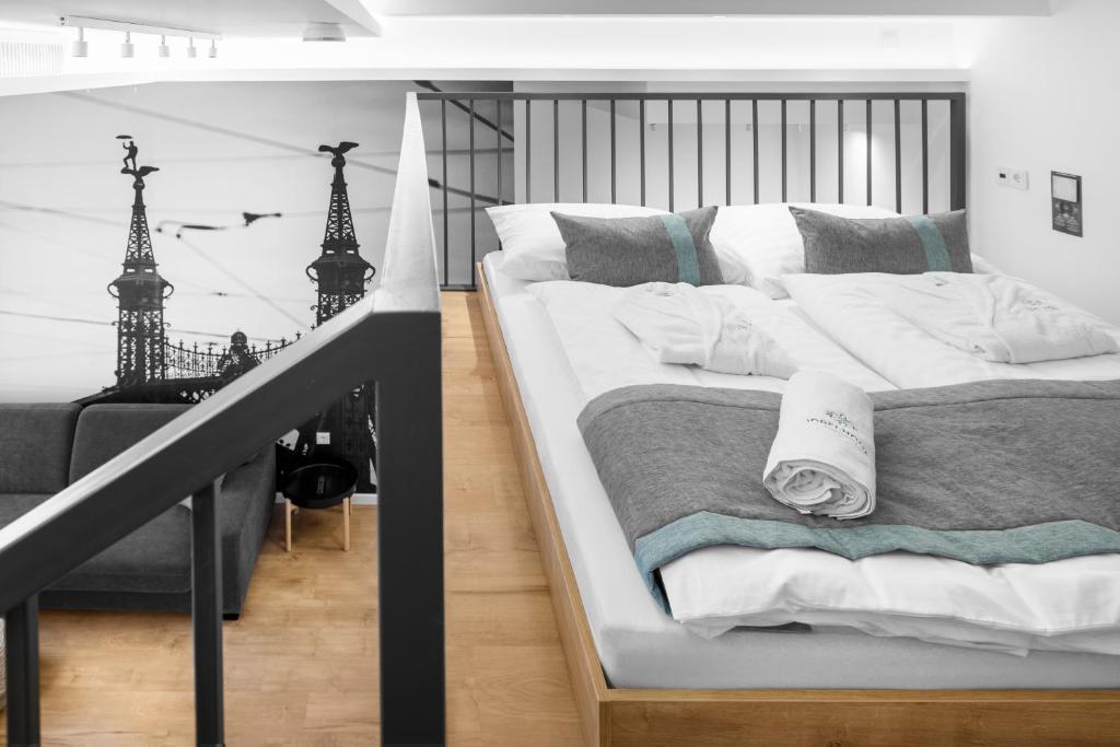 Posteľ alebo postele v izbe v ubytovaní Jobelhome Apartments