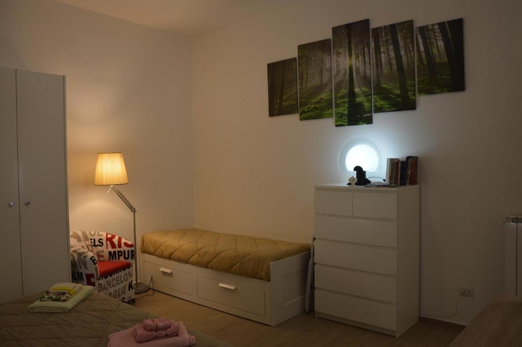 Postel nebo postele na pokoji v ubytování L'angoletto