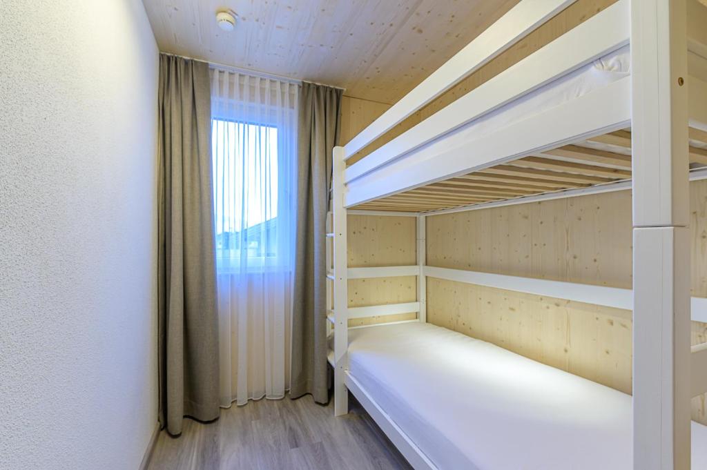 Postel nebo postele na pokoji v ubytování Residenz Schiestl