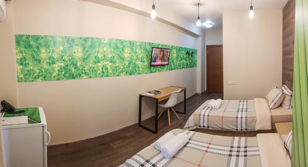 Postel nebo postele na pokoji v ubytování Wine Hotel Chisinau