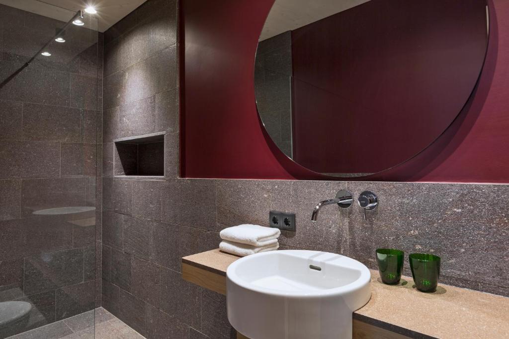 Koupelna v ubytování Natürlich Hell. Aparthotel & Camping