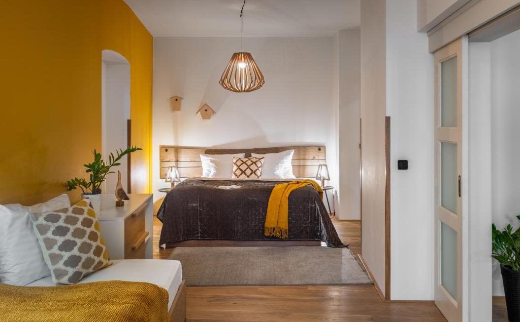 Postel nebo postele na pokoji v ubytování 4 Trees Apartments by Adrez