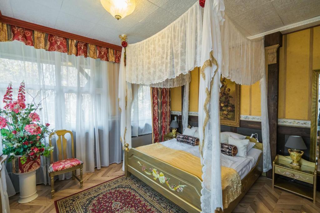 Postel nebo postele na pokoji v ubytování Janus Boutique Hotel & Spa