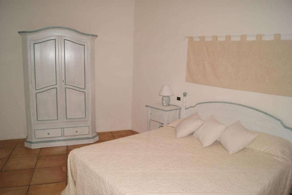 A bed or beds in a room at Case Della Marina