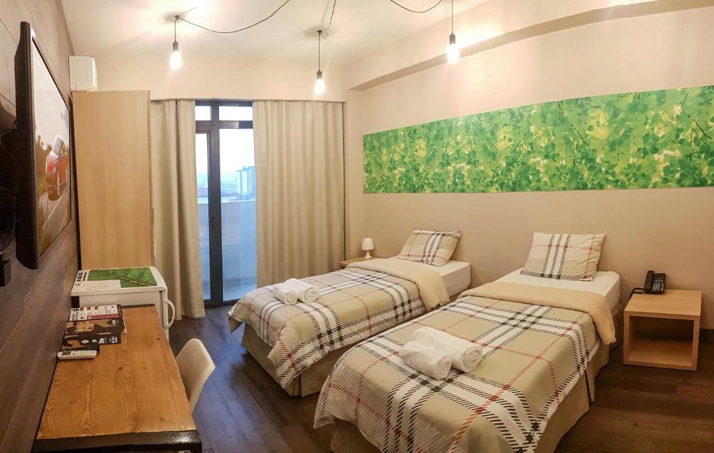Postel nebo postele na pokoji v ubytování Wine Hotel Chisinau