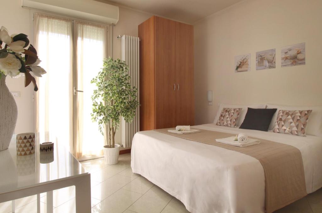 Postel nebo postele na pokoji v ubytování Residence Altamarea