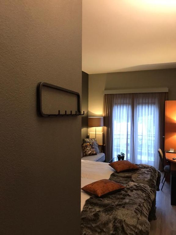 Postel nebo postele na pokoji v ubytování ´t Wapen van Marion