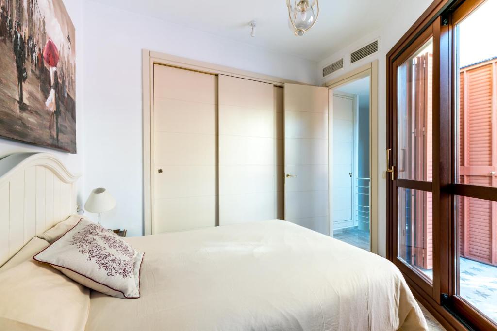 Posteľ alebo postele v izbe v ubytovaní Veoapartment Estrella