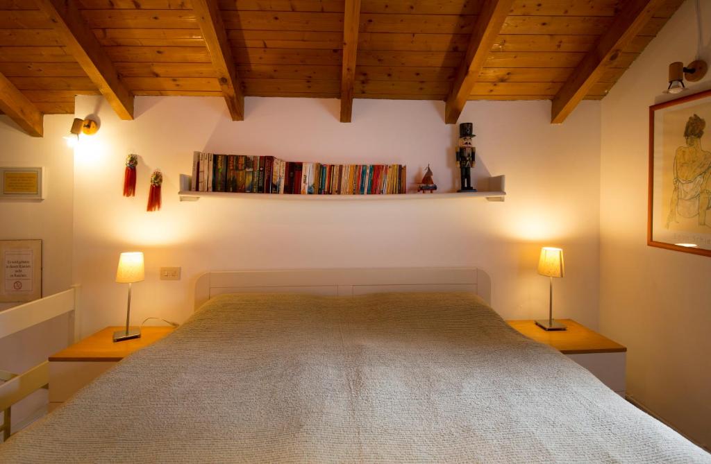 Postel nebo postele na pokoji v ubytování CORTE DI CAVNE'