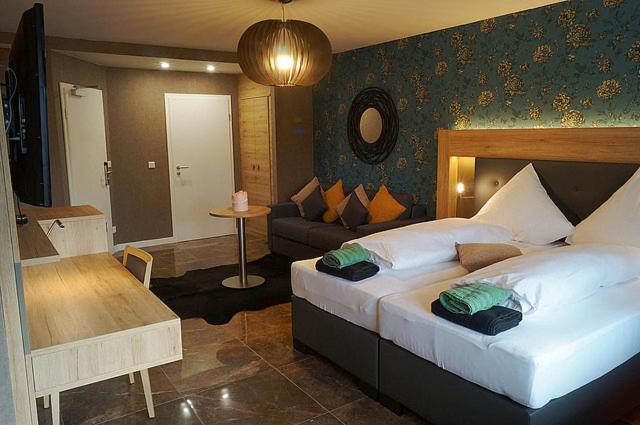 Postel nebo postele na pokoji v ubytování Hotel Diamond