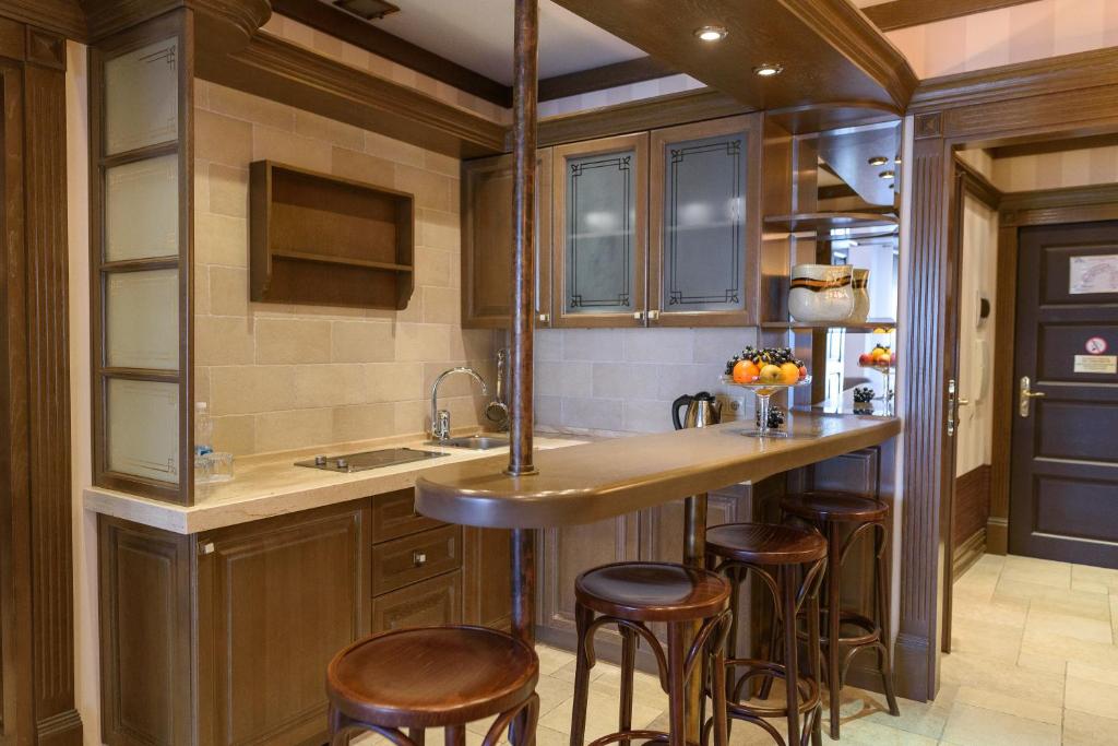 Kuchyň nebo kuchyňský kout v ubytování Apart-Hotel Chale Graal
