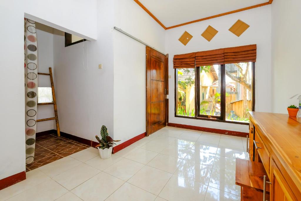 Kuta Circle Homestay - ダブルルーム ガーデンビュー