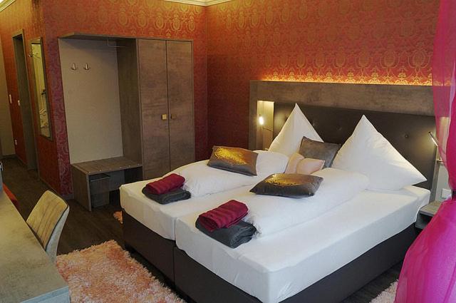 Postel nebo postele na pokoji v ubytování Hotel Diamond
