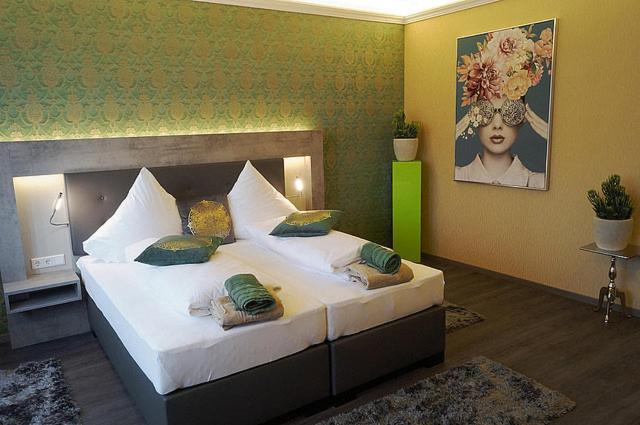Postel nebo postele na pokoji v ubytování Hotel Diamond