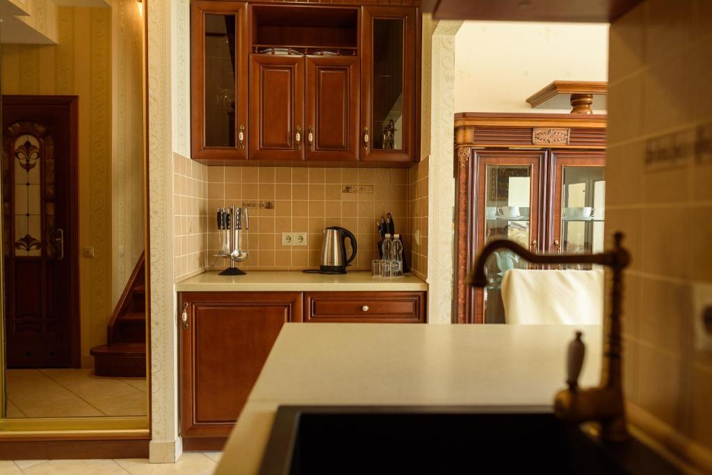 Kuchyň nebo kuchyňský kout v ubytování Apart-Hotel Chale Graal