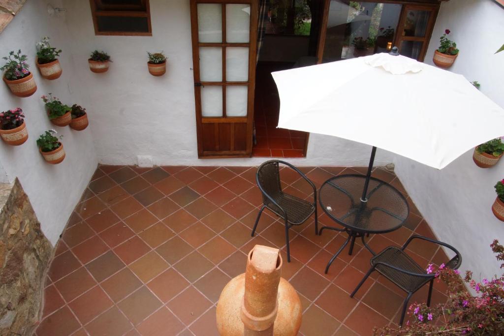 Patio nebo venkovní prostory v ubytování Hostal Renacer