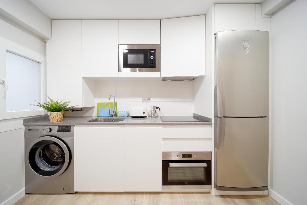 Kuchyň nebo kuchyňský kout v ubytování Apartamento Centro-Nautico V