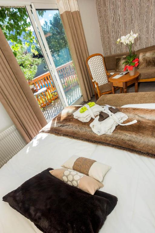 Posezení v ubytování Hôtel & Spa Les Bartavelles