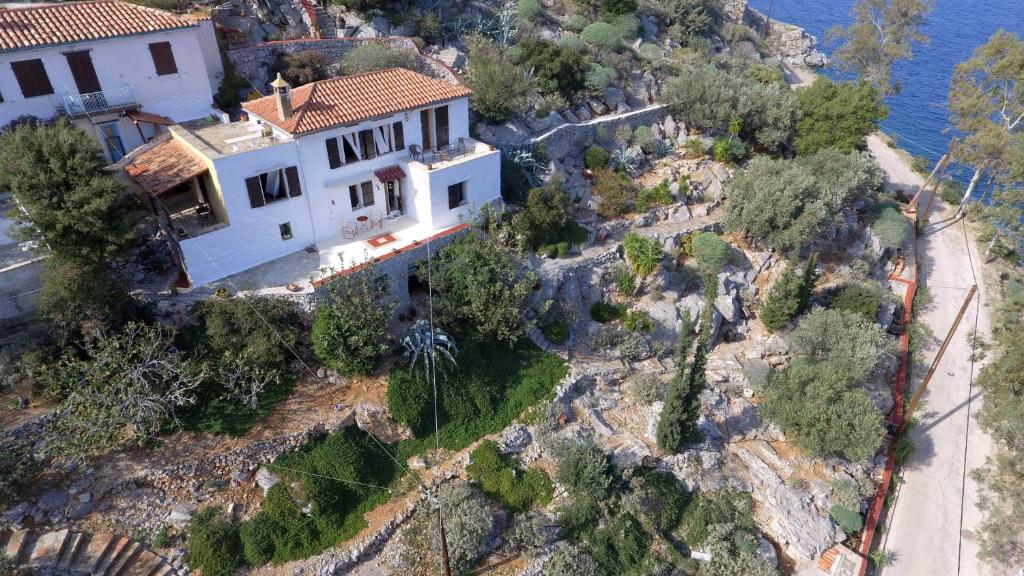 an aerial view of a house on a cliff at Arbeli house in Mandraki