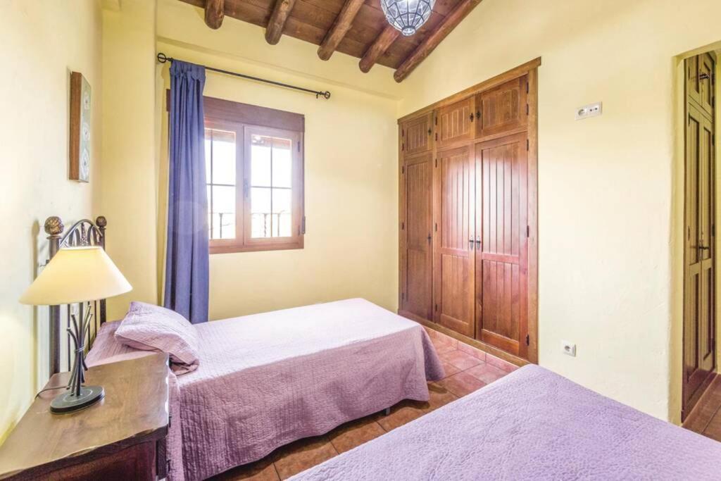 Postel nebo postele na pokoji v ubytování El Manantial