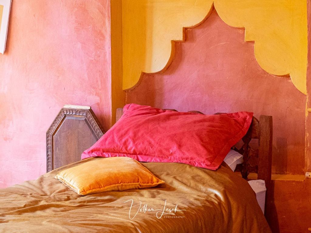 Postel nebo postele na pokoji v ubytování Riad Tabhirte