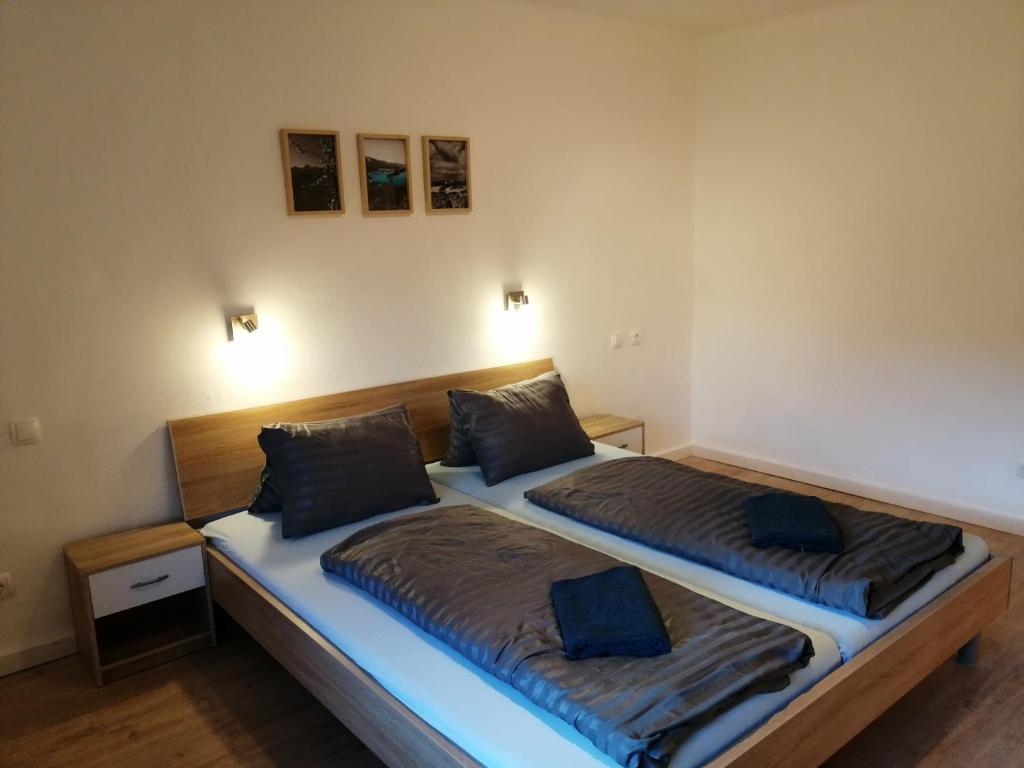 Postel nebo postele na pokoji v ubytování Parkweg Lodge