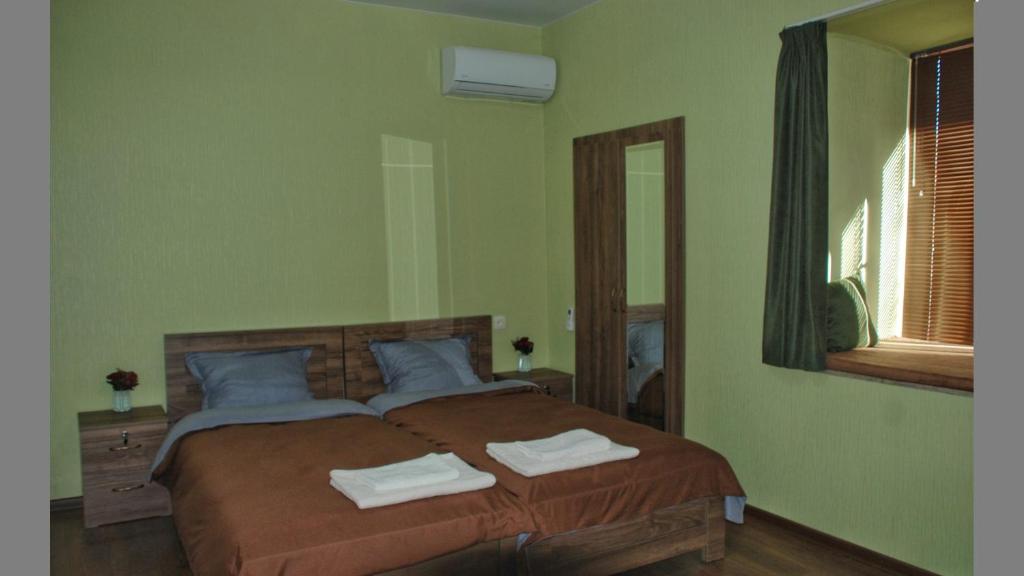 Postel nebo postele na pokoji v ubytování Guesthouse Amarela