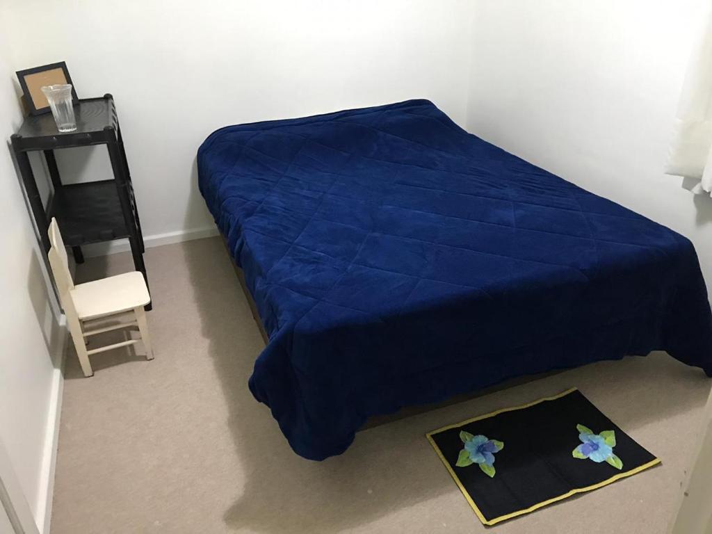Cama o camas de una habitación en Cozy room in Mercês