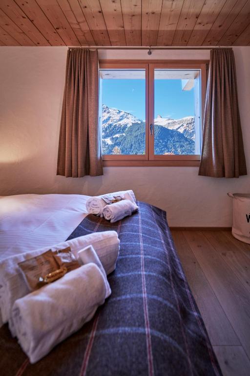 Postel nebo postele na pokoji v ubytování Chalet Bärgsunna Penthouse