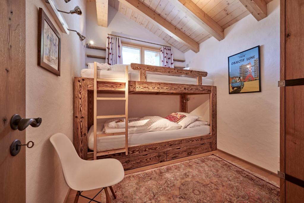 Postel nebo postele na pokoji v ubytování Chalet Bärgsunna Penthouse