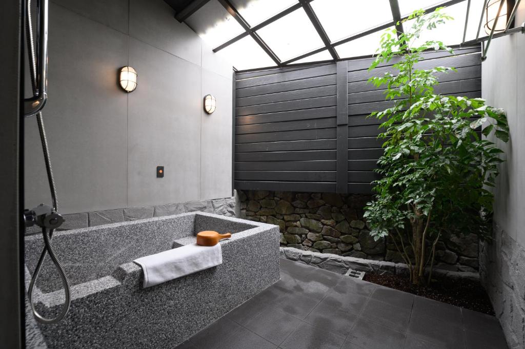 Koupelna v ubytování Yunoyado Onsen Hot Spring Hotel Deyang