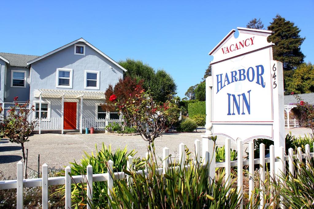 a sign for a harbors inn in front of a house at Harbor Inn in Santa Cruz