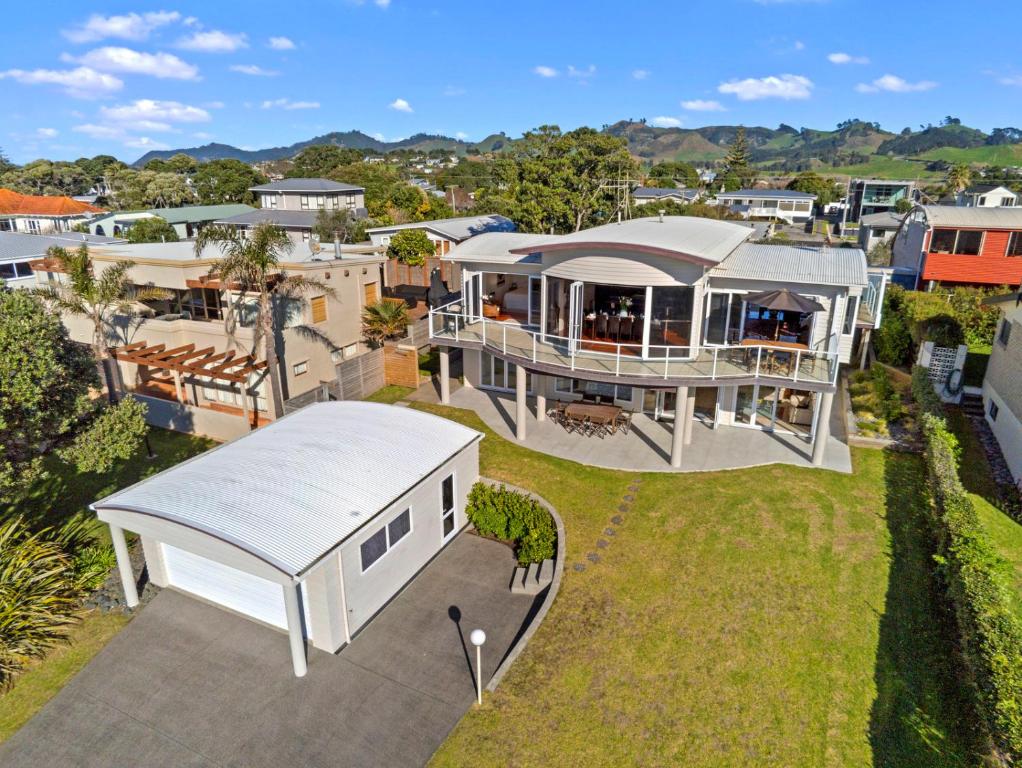 an aerial view of a house with a roof at Sea Shells By The Shaw - Waihi Beach Holiday Home in Waihi Beach