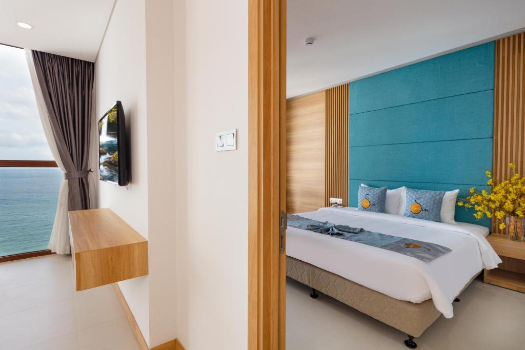 TV a/nebo společenská místnost v ubytování Sun Kiss Hotel