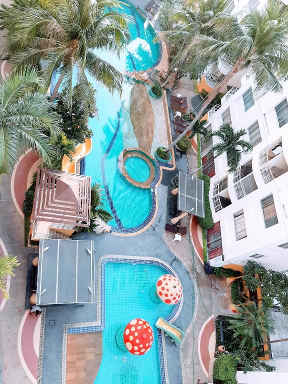 an overhead view of a pool at a resort at Hinnam Saisuay by One in Hua Hin