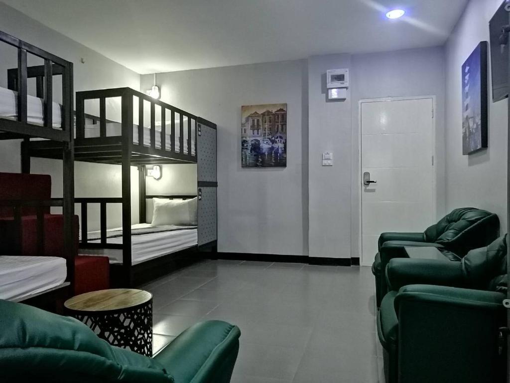 Postel nebo postele na pokoji v ubytování Sabai Place Donmueang Airport
