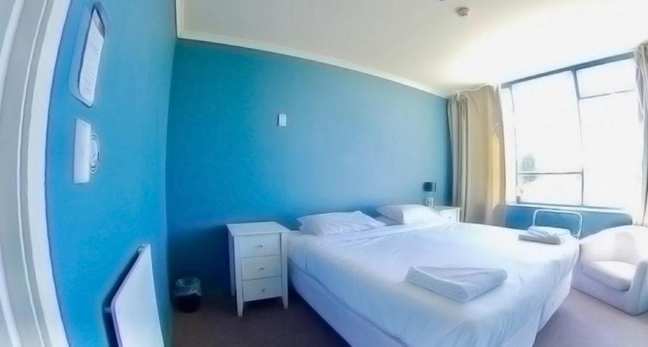 Postel nebo postele na pokoji v ubytování Rotorua Downtown Backpackers