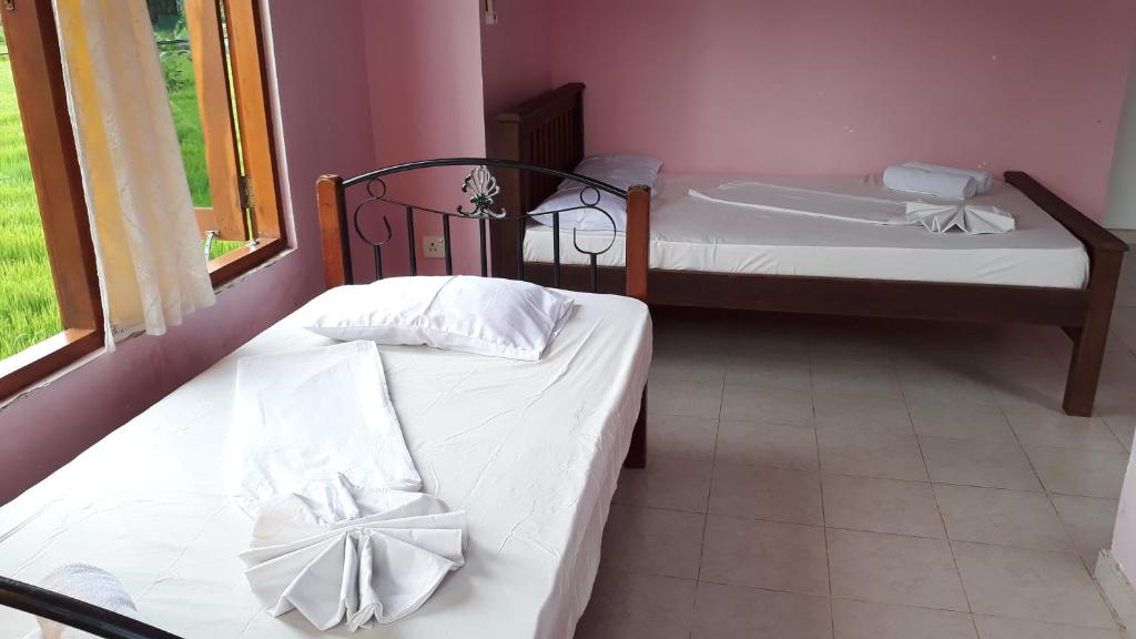 Postel nebo postele na pokoji v ubytování On Time Villa