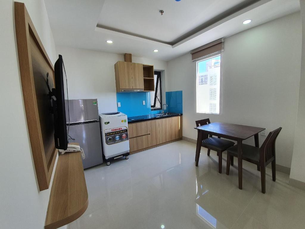 Nhà bếp/bếp nhỏ tại XO Hotel & Apartments