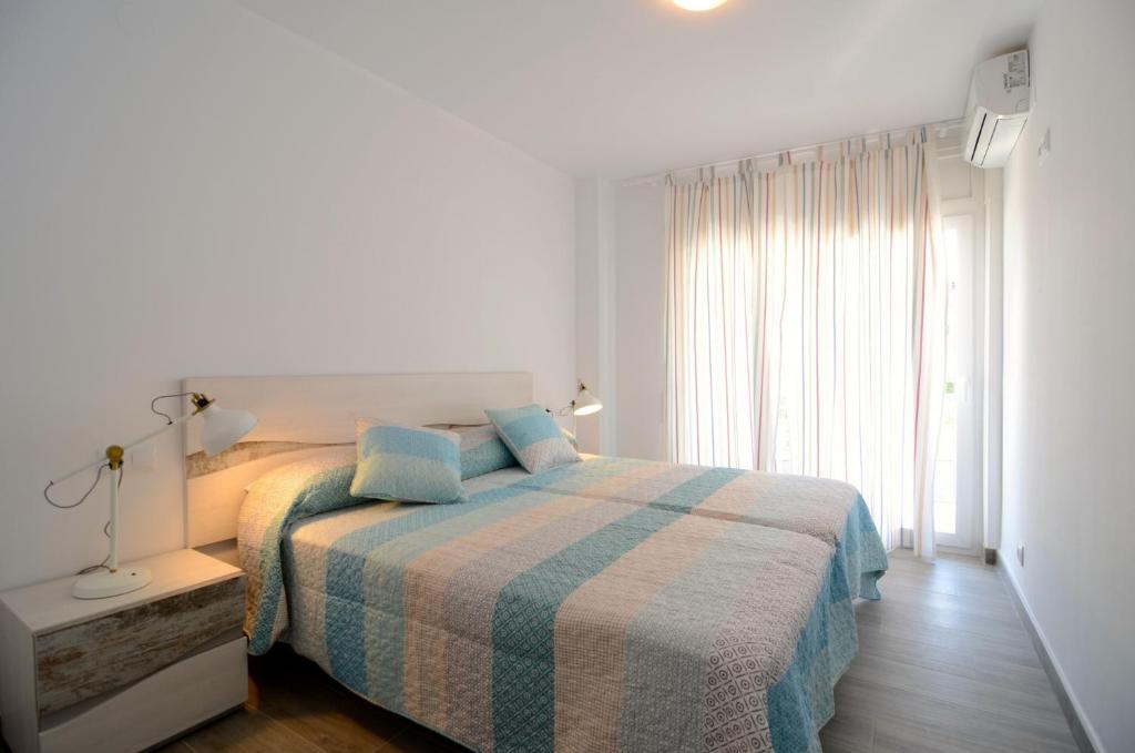 Postel nebo postele na pokoji v ubytování Rocamaura III BX-9 - planta baja