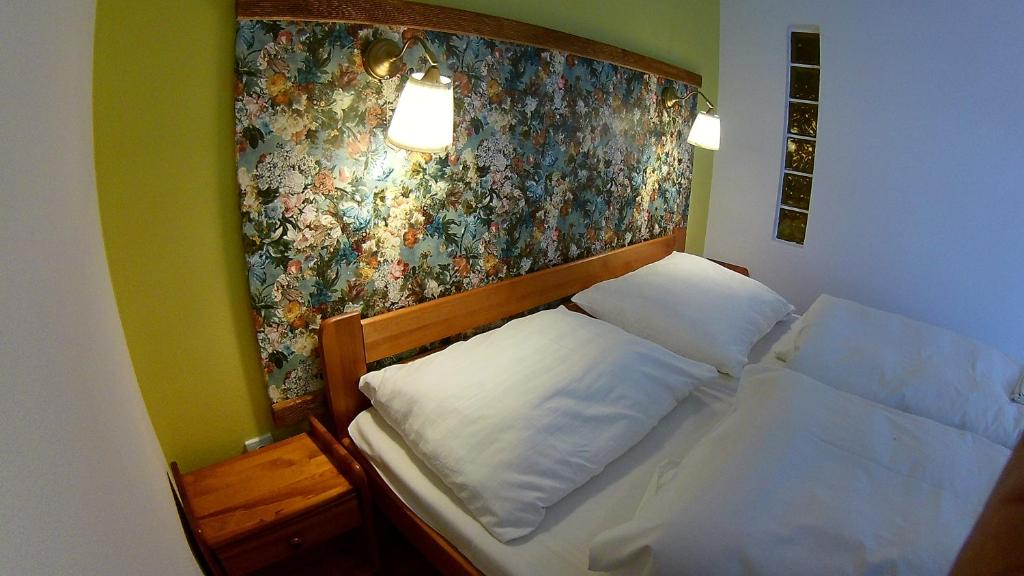 Postel nebo postele na pokoji v ubytování Penzion Slunečno