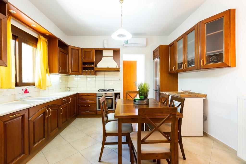 Kuchyň nebo kuchyňský kout v ubytování Stefanakos House