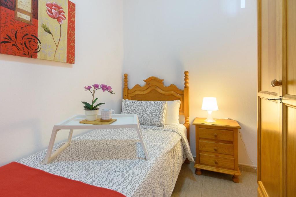 Postel nebo postele na pokoji v ubytování Casa Ancla